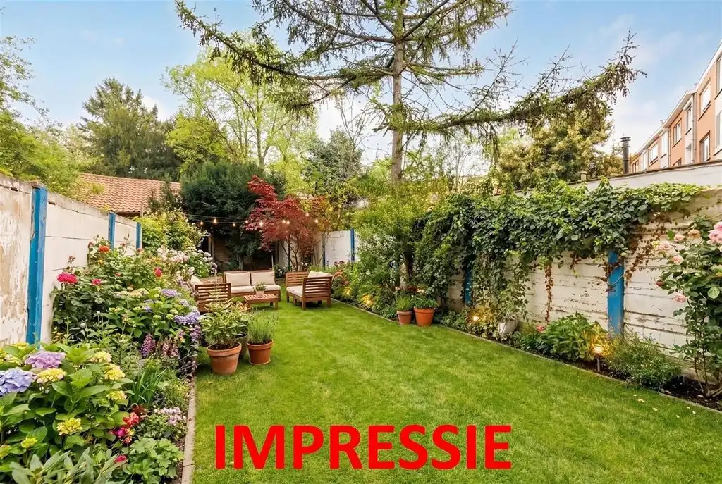 Gerenoveerd gelijkvloers appartement met zonnige tuin foto 4