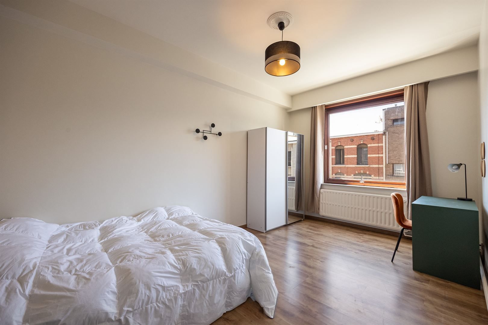 Ruim appartement met 4 slaapkamers en veel lichtinval foto 13