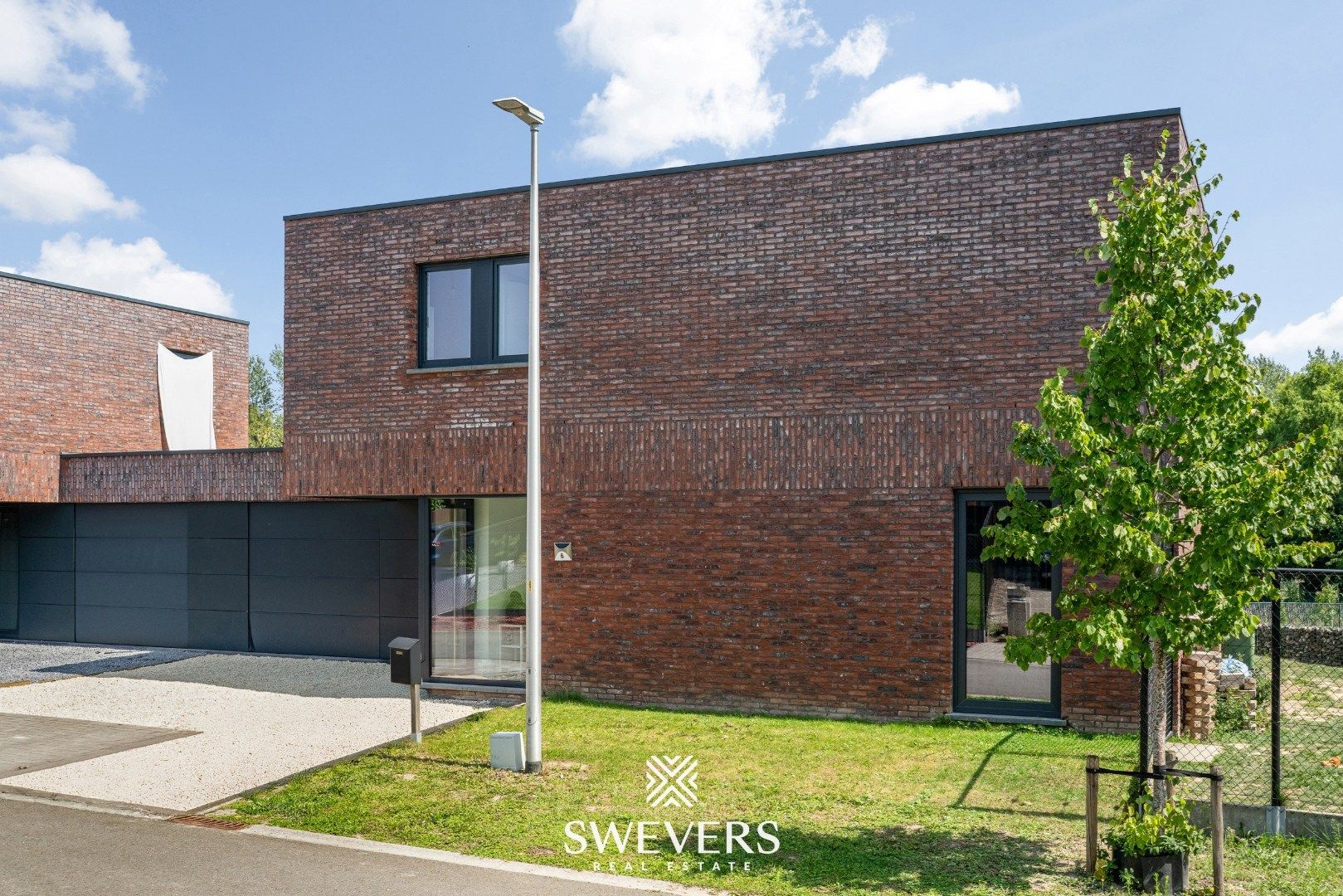 Recente, instapklare en energiezuinige woning op rustige straat te Kortessem foto 29