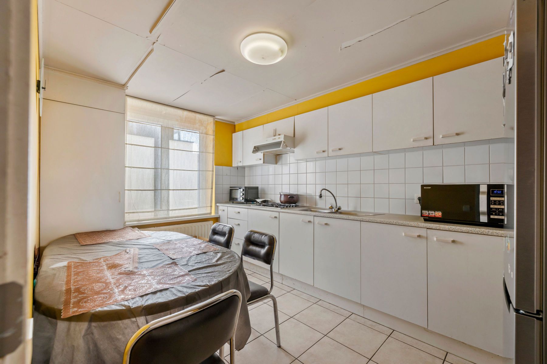 Charmante rijwoning met koer op geliefde locatie foto 7