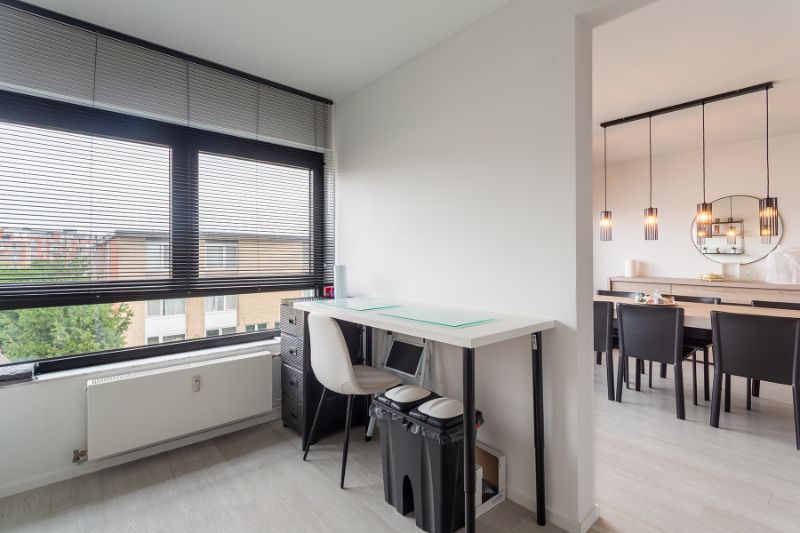 Ruim en lumineus, instapklaar 2 slpk. app. met terras en zicht op het groen+P! foto 11