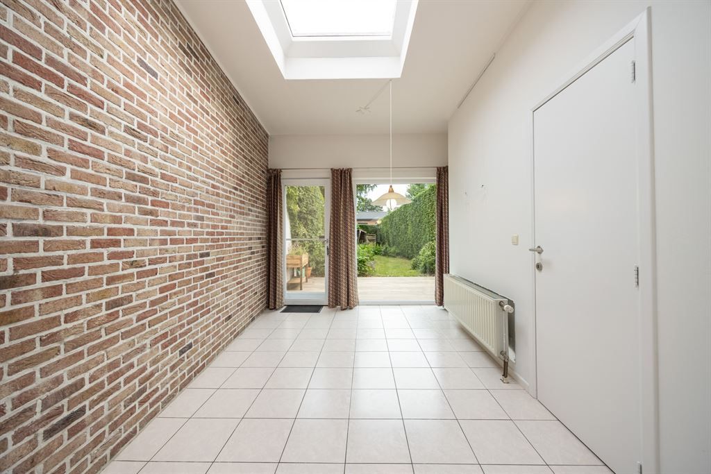 Instapklare gezinswoning met leuk tuintje! foto 11