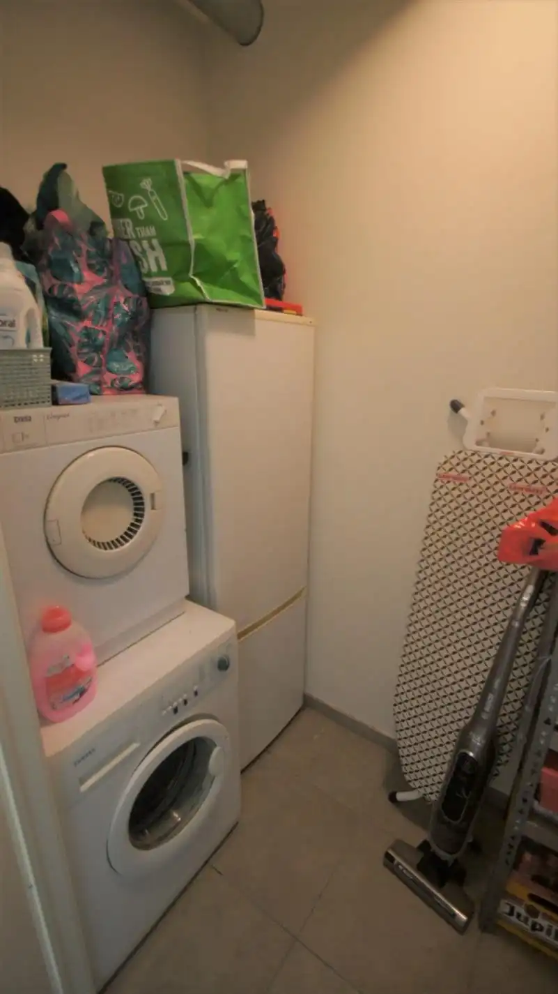 Prachtig app. met 2 slpks, autostaanplaats en ruim terras (55 m²!) foto 10