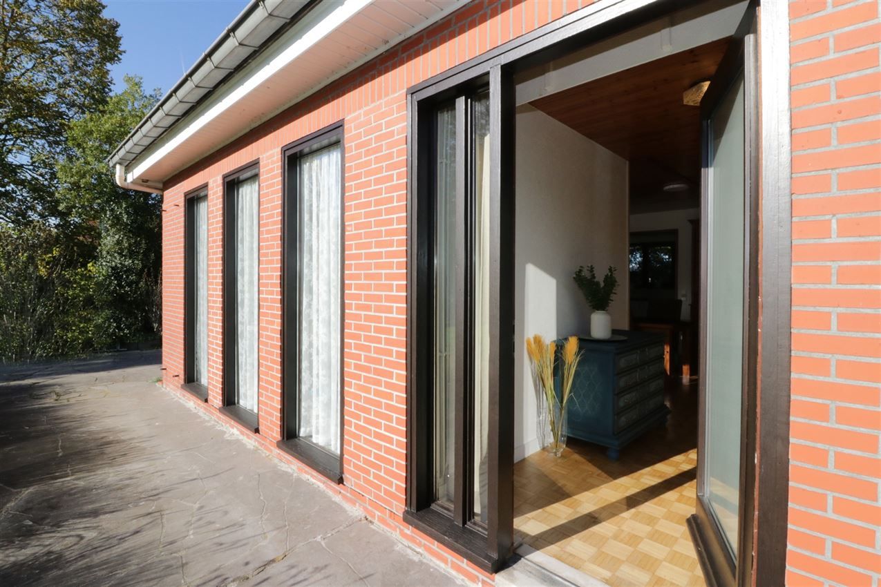 Rustig gelegen woning met 2 slpk, riante tuin en garage foto 3