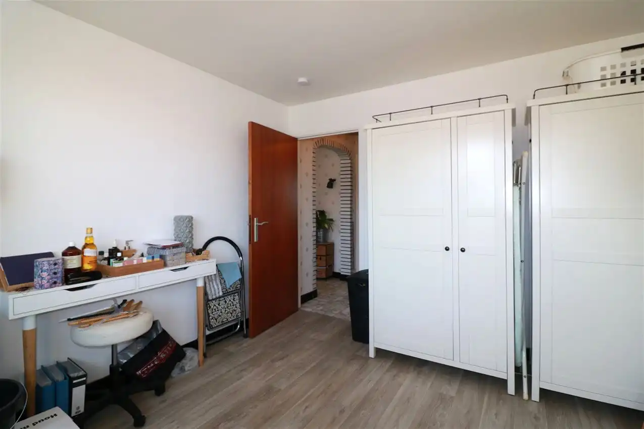 Gusting gelegen woning met 2 slpk, garage en tuin foto 19