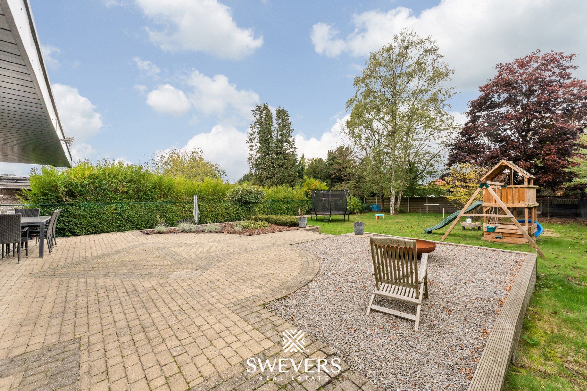 Knusse, hedendaagse gezinswoning met warme indeling en grote, zonnige tuin foto 45