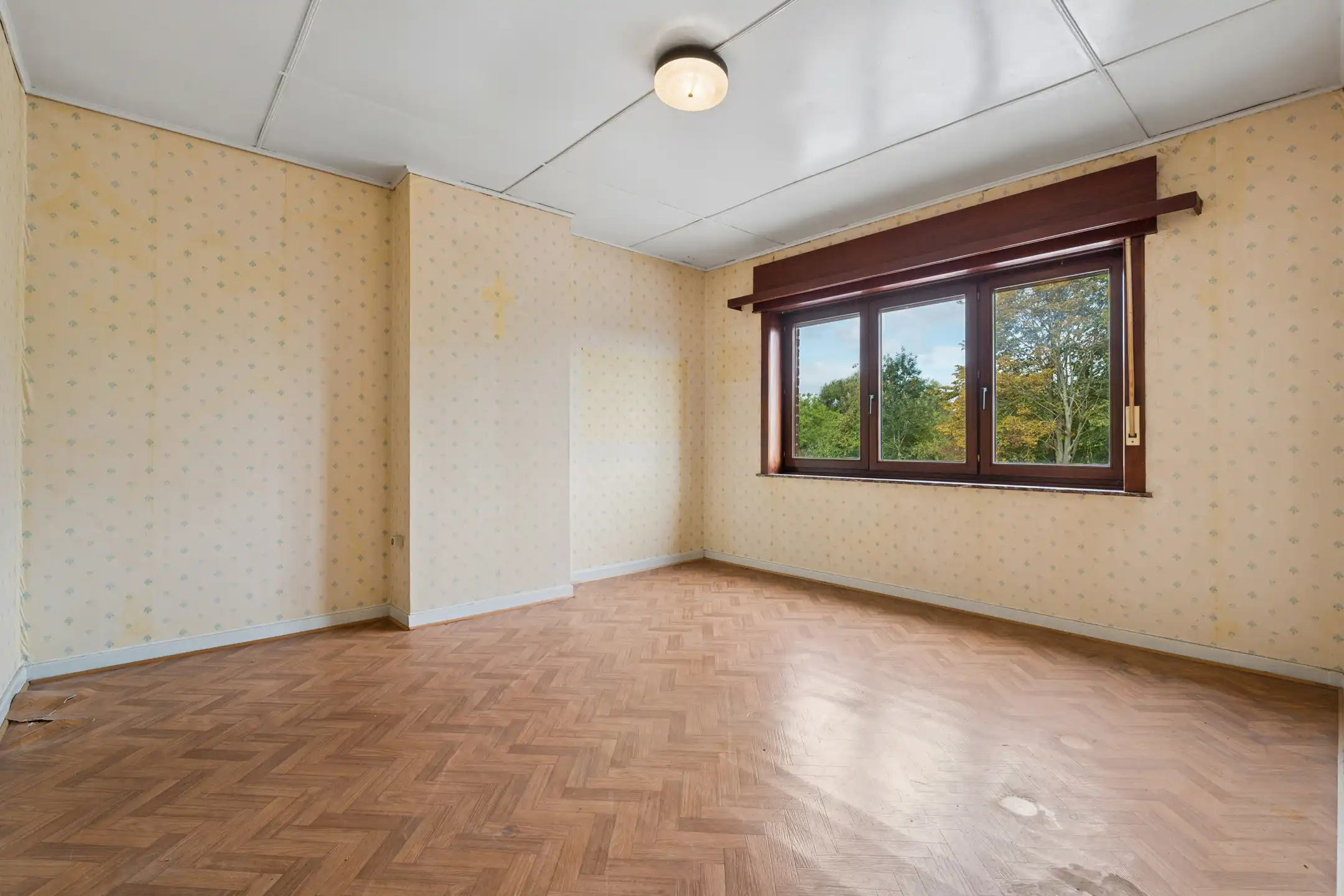Te renoveren woning met tuin op centrale ligging foto 14