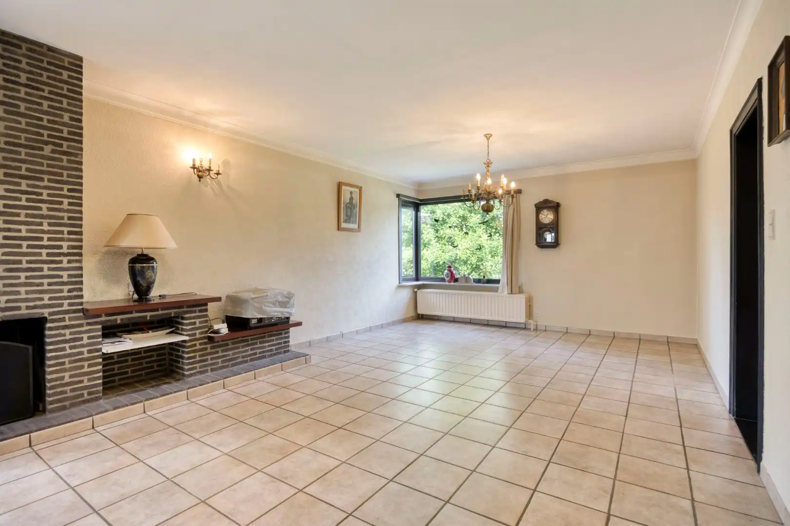 Gelijkvloerse woning met 3 slpks op een uniek perceel van 2.164 m² nabij de Markt !  foto 4