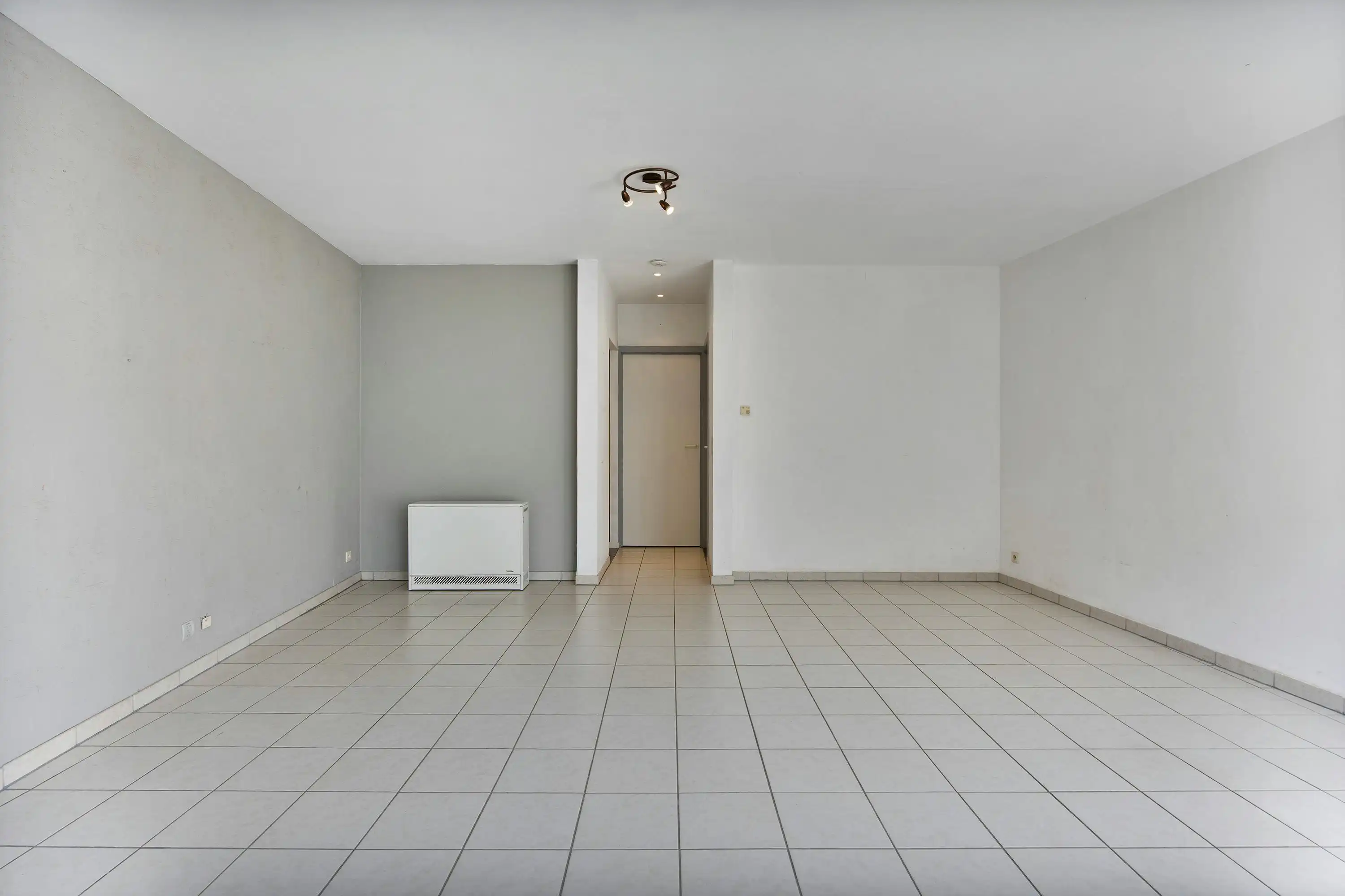 Instapklaar gelijkvloers appartement met gemeenschappelijke tuin en fietsenberging in hartje Kapellen! foto 5