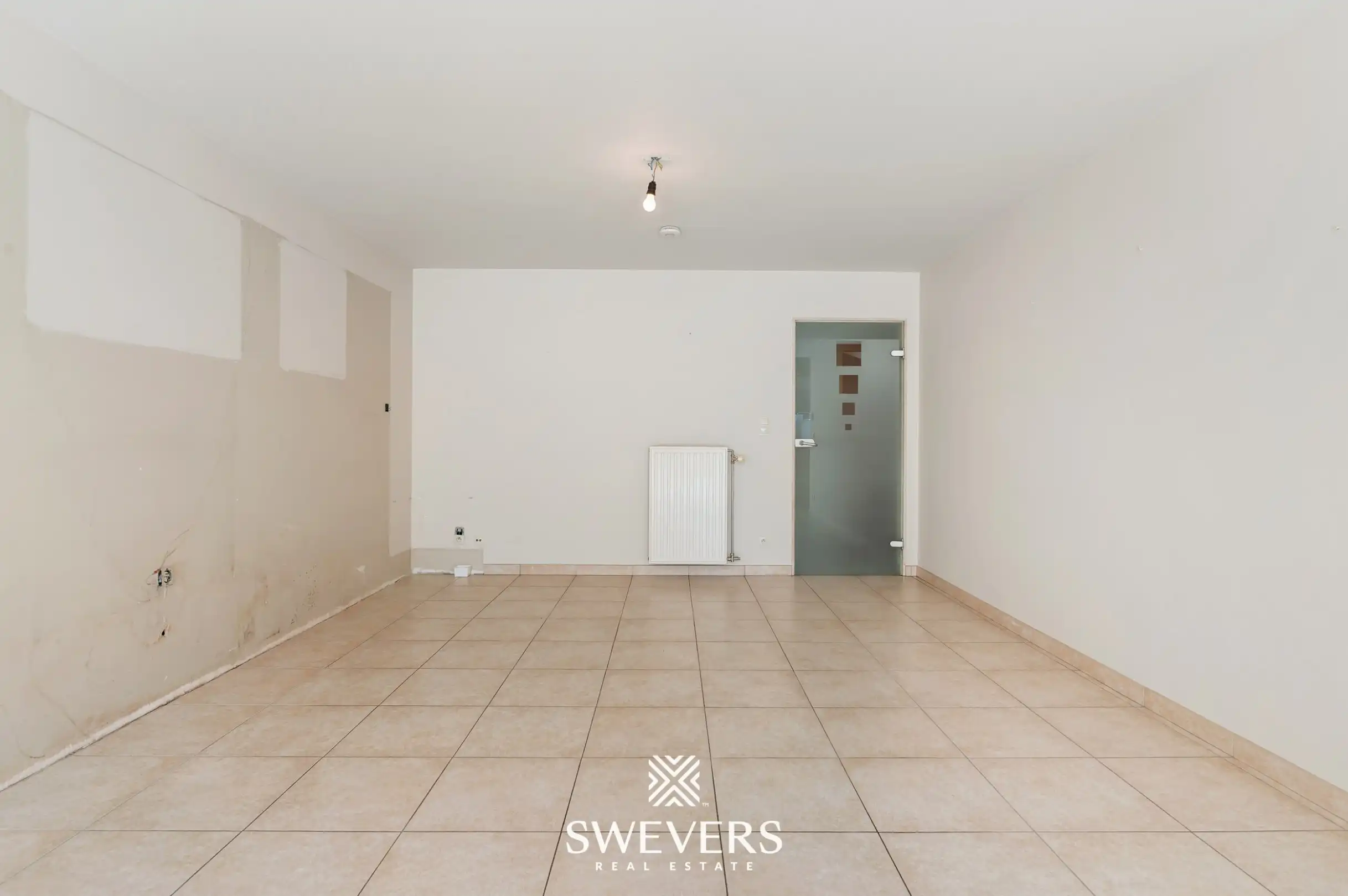 Gelijkvloers appartement met twee slaapkamers, ruime veranda en terras te Bree foto 2