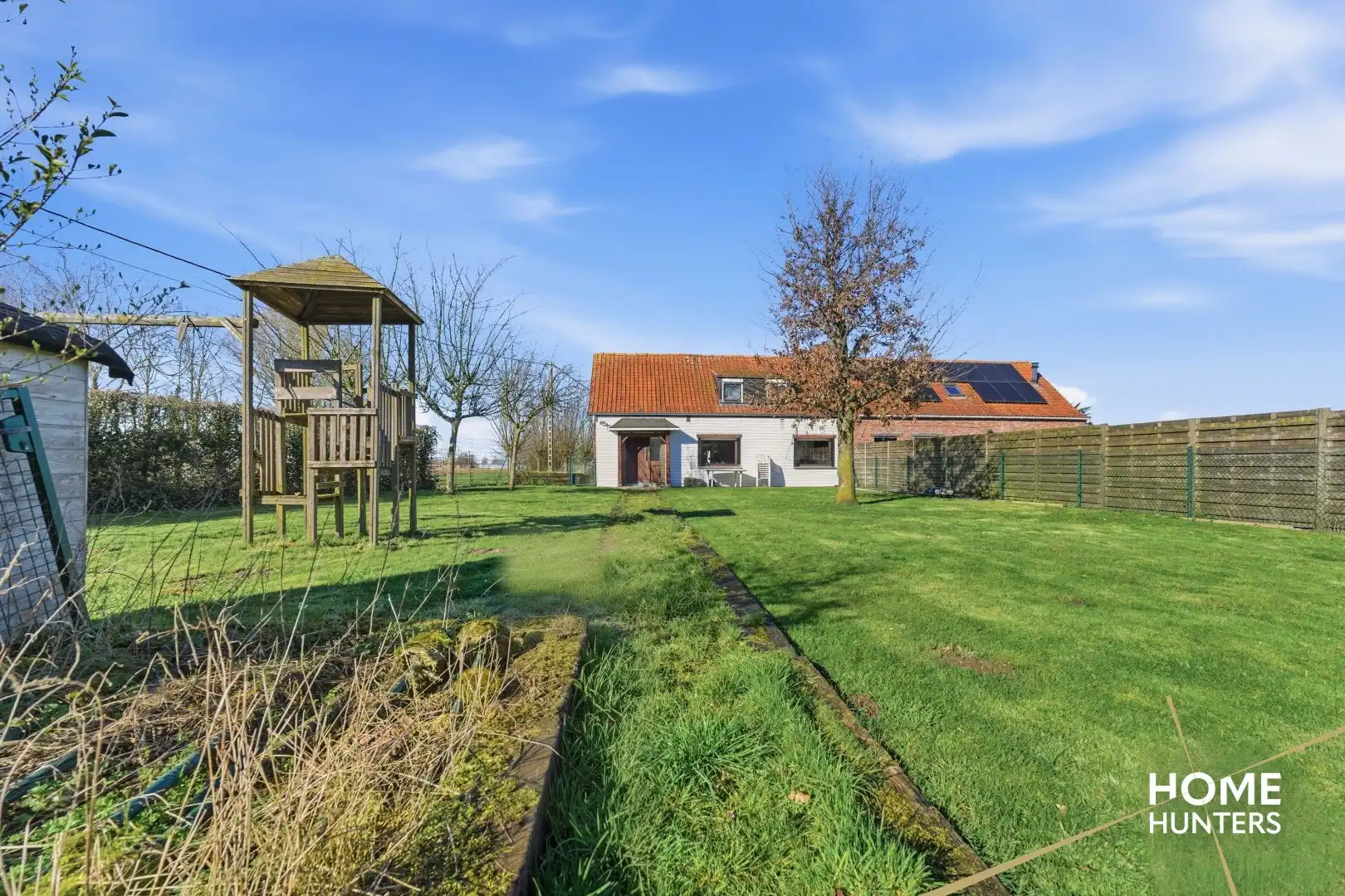 Rustig gelegen halfopen bebouwing met ruime tuin in Hooglede! foto 13