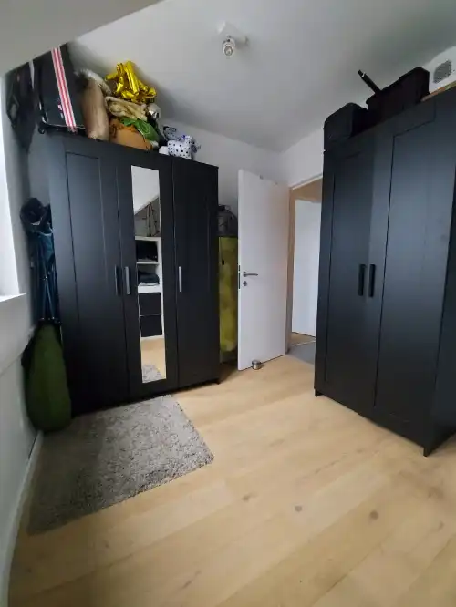 Lichtrijk en energiezuinig 2-slaapkamerappartement met lift, terras en kelderruimte foto 10