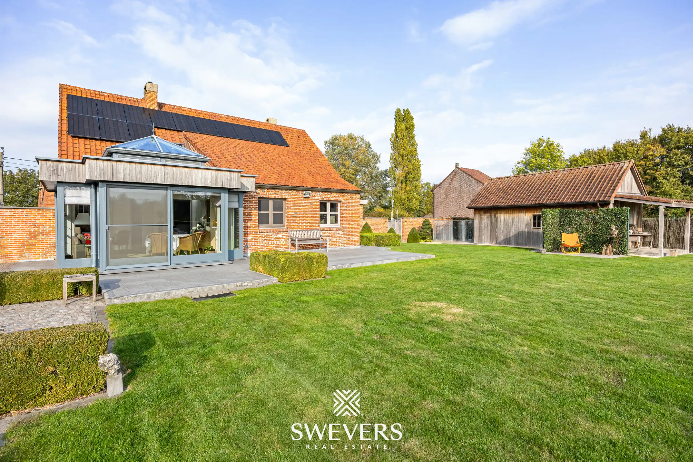 Sfeervolle open bebouwing met royale tuin en veel privacy foto 26