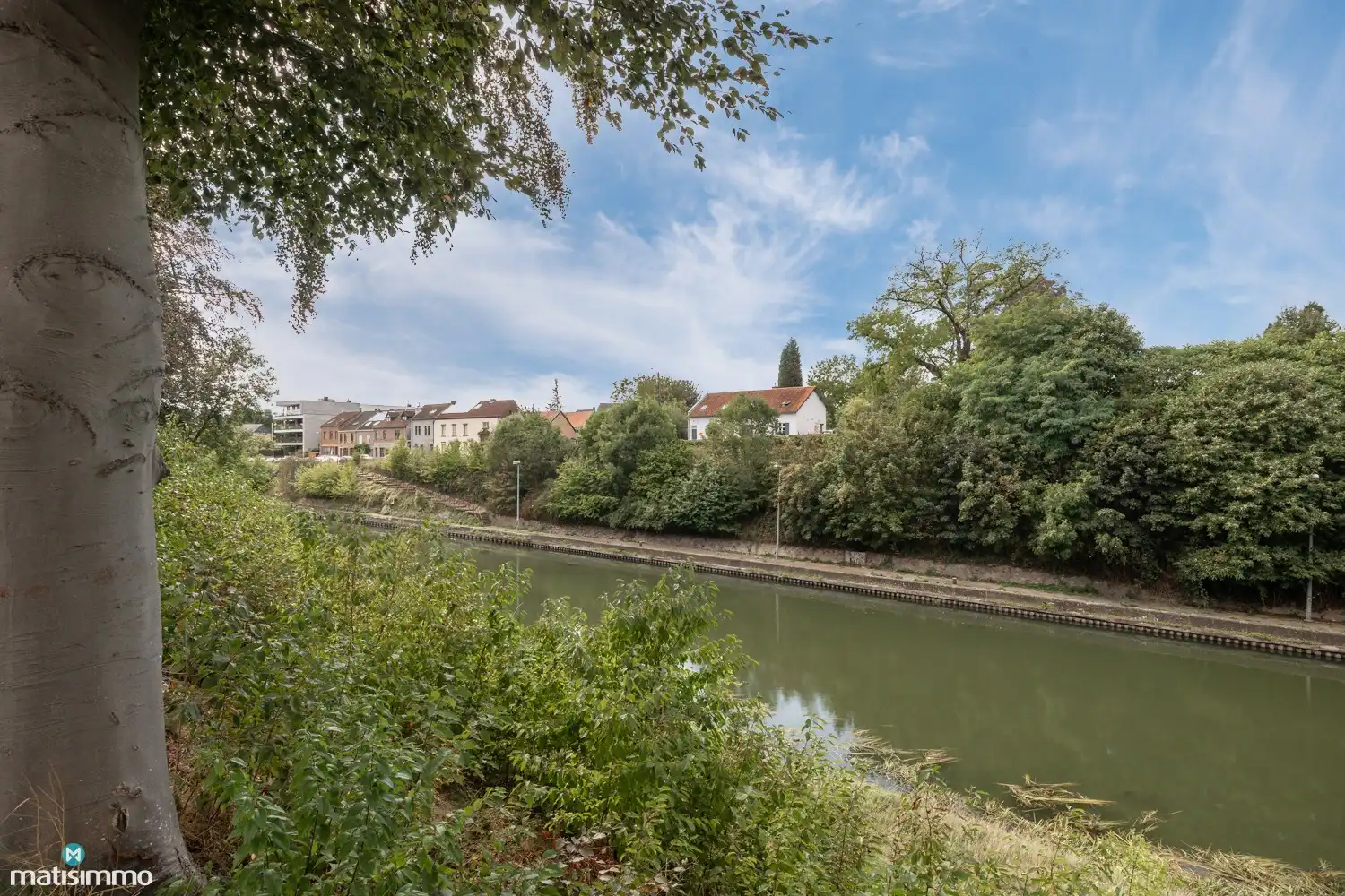 INSTAPKLAAR GERENOVEERDE WONING MET 3 SLAAPKAMERS, GARAGE, CARPORT EN PRACHTIGE TUIN NABIJ HET KANAAL EN DE MAAS IN LANAKEN foto 43