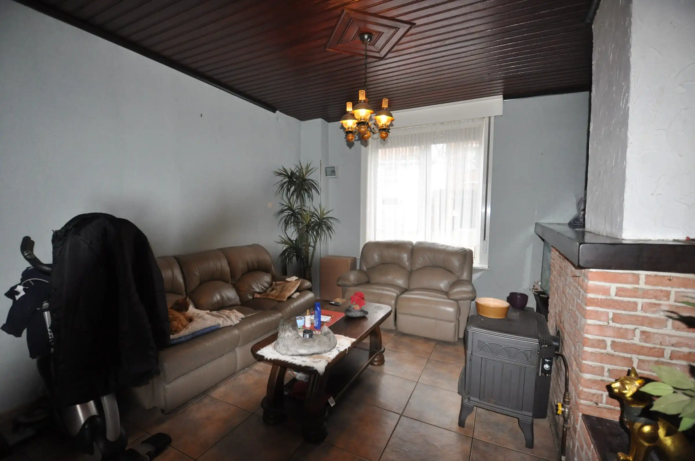 Te renoveren woning met grote zongerichte tuin ! foto 3