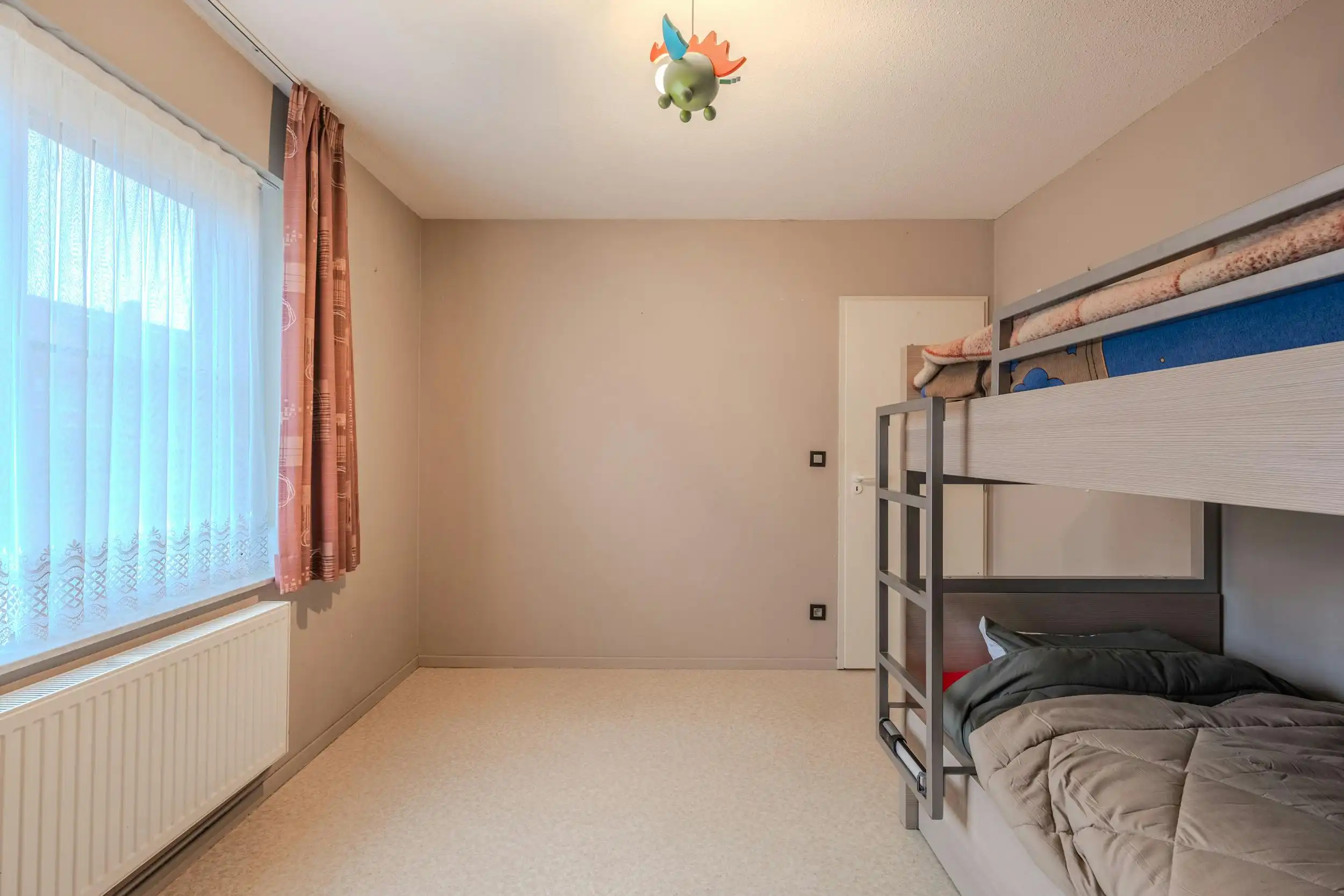 Instapklare rijwoning met zonnige tuin te Oostende foto 10