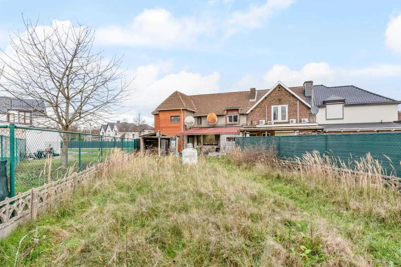 Woning met uitzonderlijk potentieel voor totale renovatie in Genk foto 17