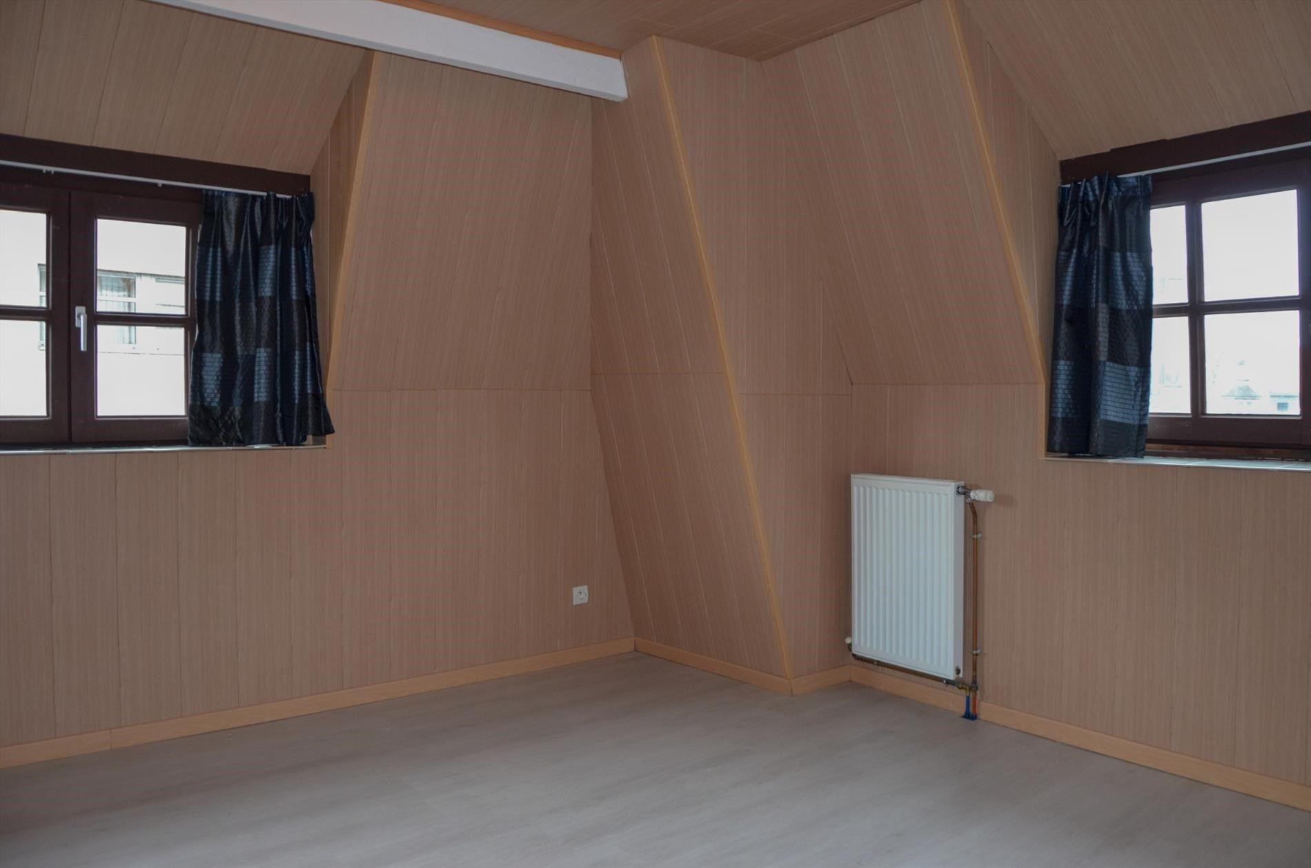 Hoekwoning met 2 slaapkamers en koertje. foto 13