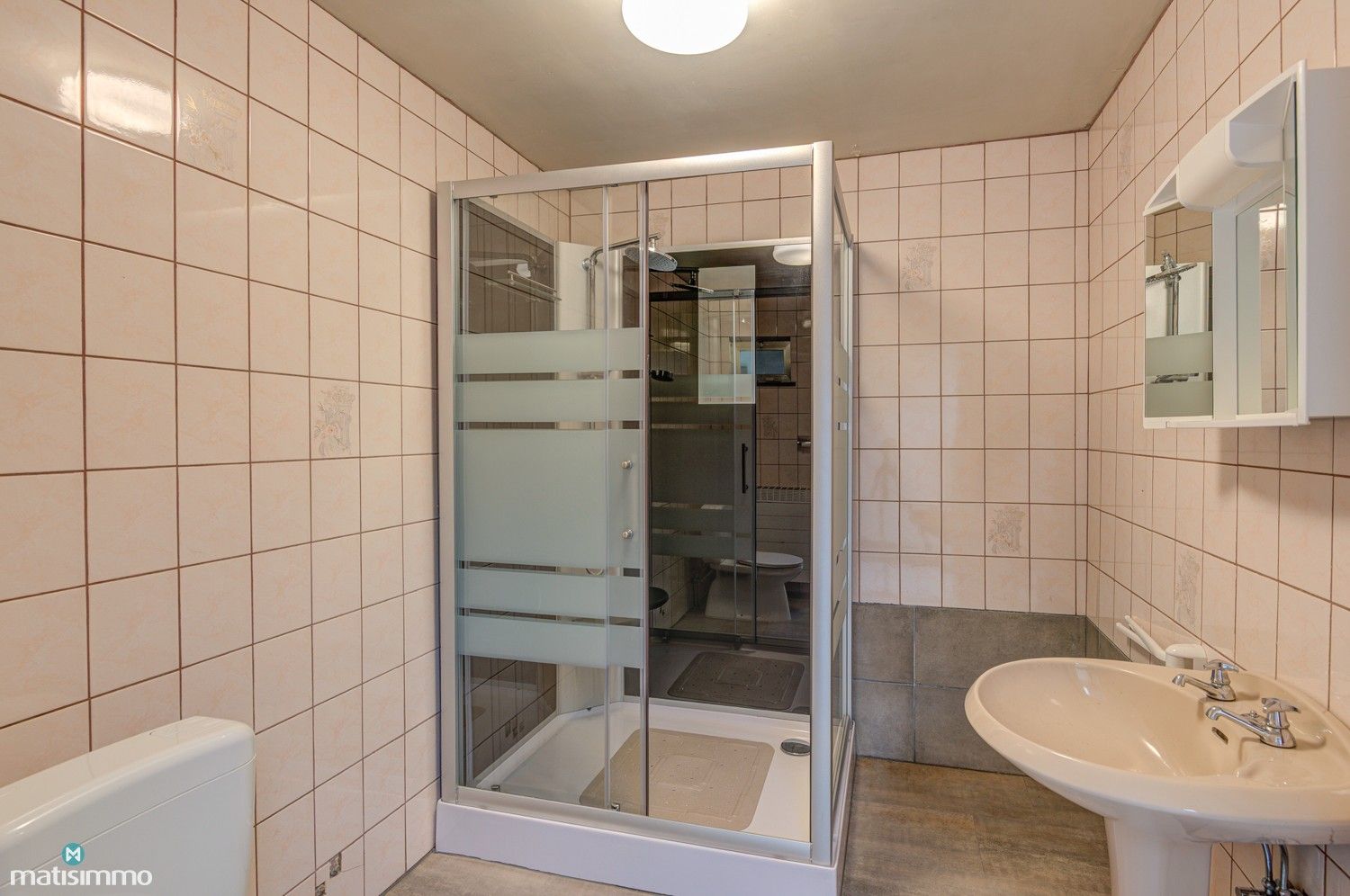 GEZINSWONING MET RUIME TUIN EN DRIE SLAAPKAMERS IN MARTENSLINDE foto 14