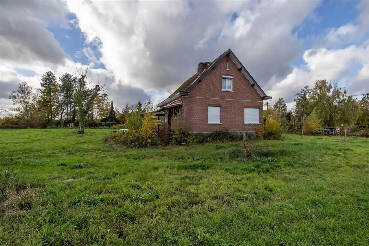 Uniek perceel van 50a33ca met af te breken woning aan agrarisch gebied foto 15