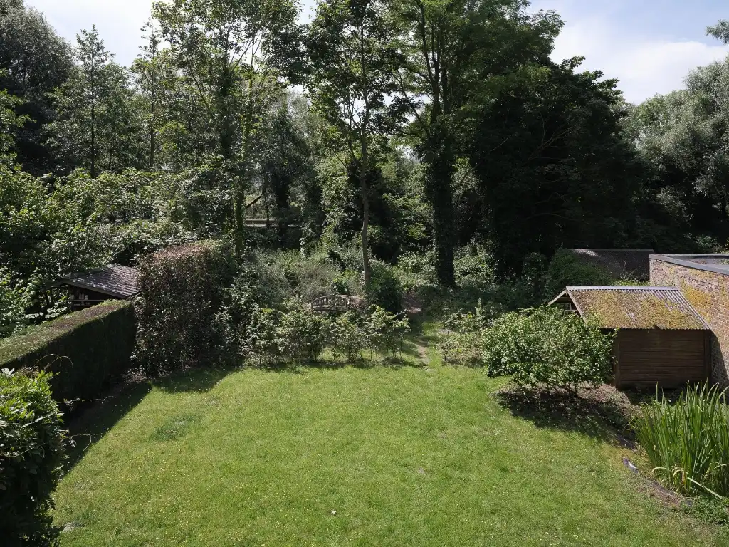 Halfopen bebouwing op een zuidgericht perceel, gelegen nabij station Gent-Sint-Pieters. foto 15