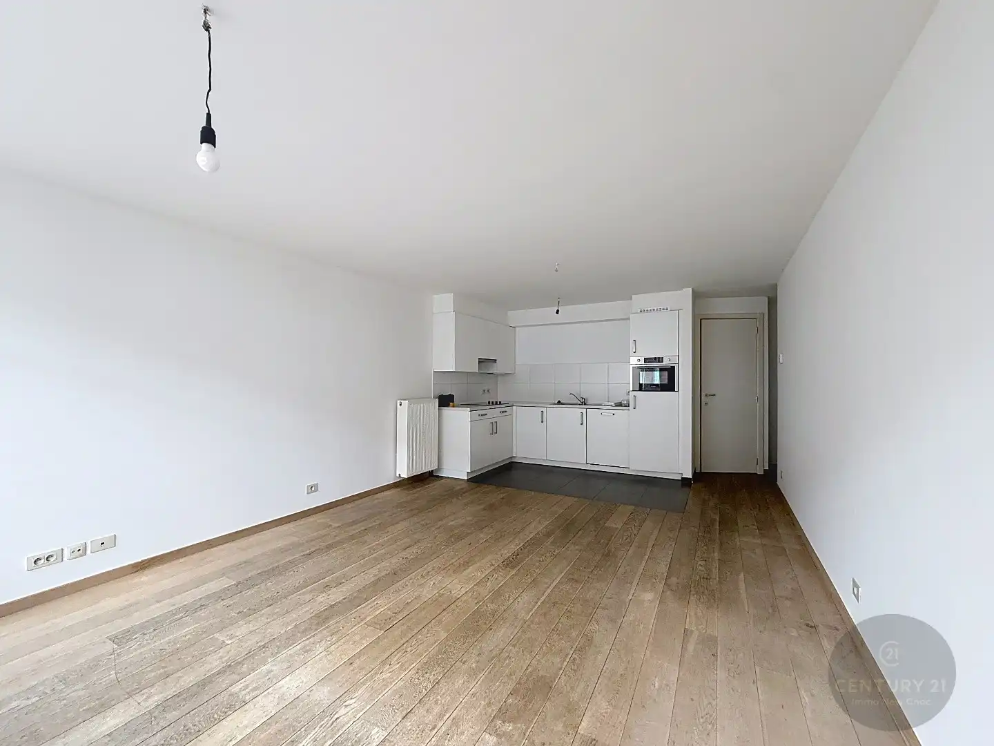 2 slaapkamer appartement met koer en garagestaanplaats foto 2