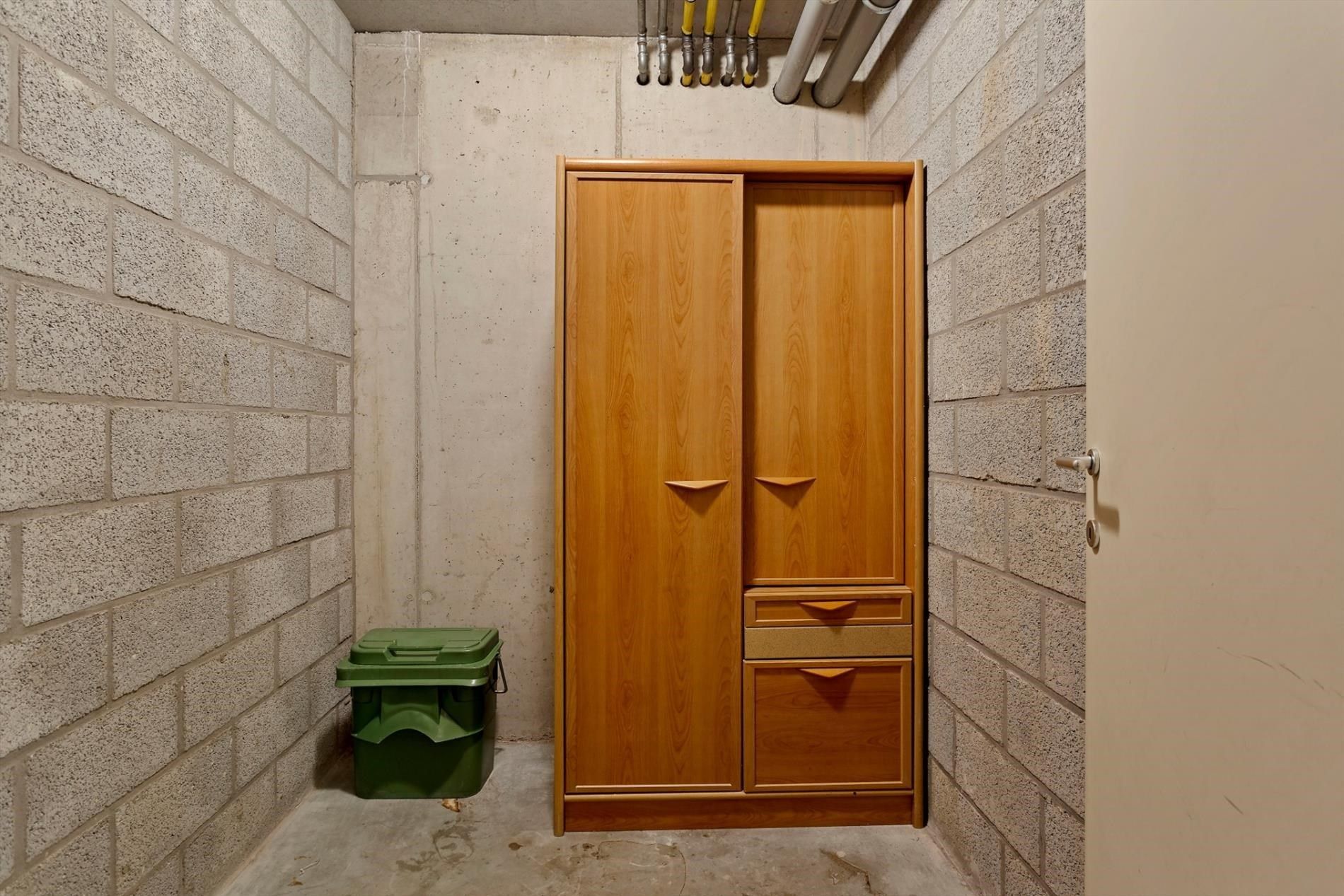 Aangenaam en luchtig appartement met 1 slaapkamer, terras & autostandplaats in ondergrondse garage in hartje Hoeselt foto 19