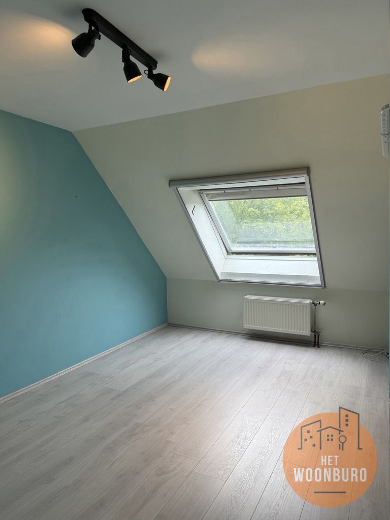 Ruime open bebouwing met garage en tuin foto 15