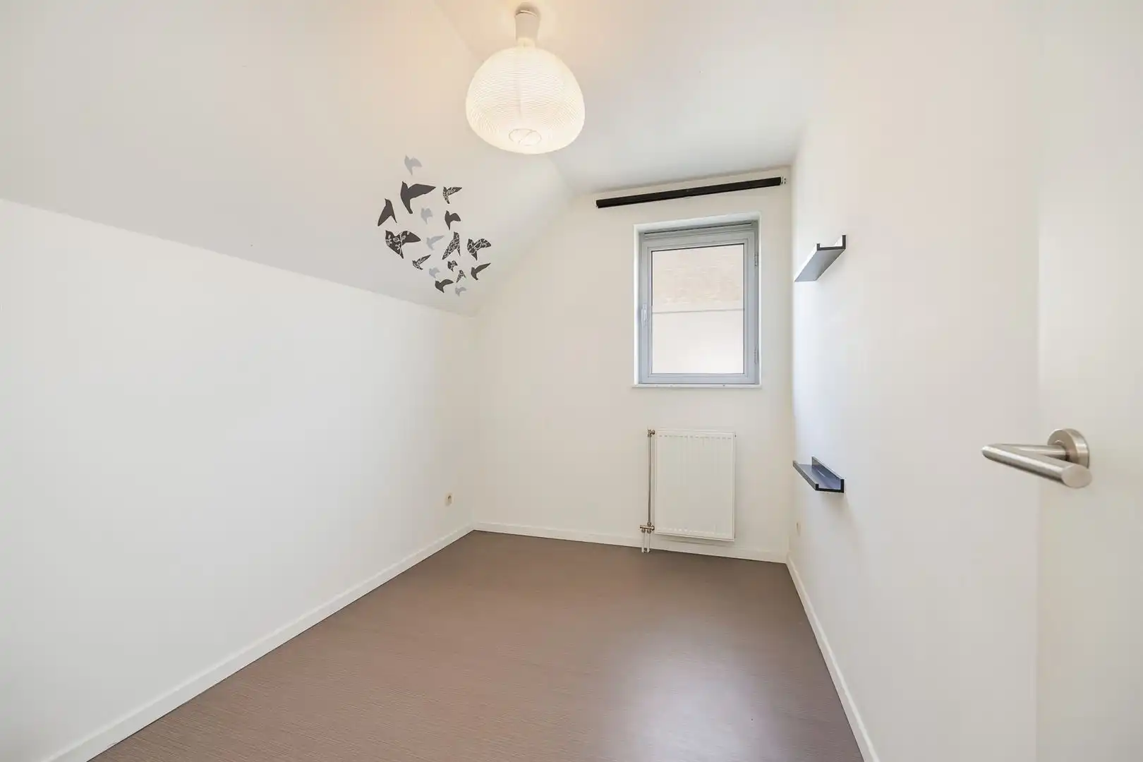 Lichtrijk dakappartement met 2 slaapkamers en ruim terras foto 16