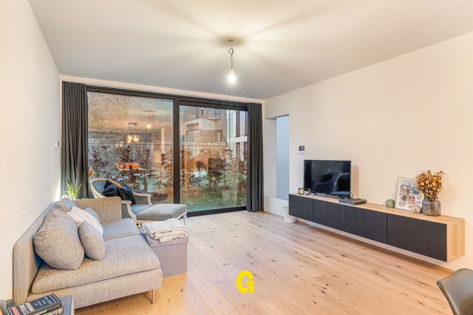 Recent gelijkvloersappartement met 2 slaapkamers, terras, voor- en achtertuin, standplaats en extra ruime berging in hartje Hoeselt foto 8