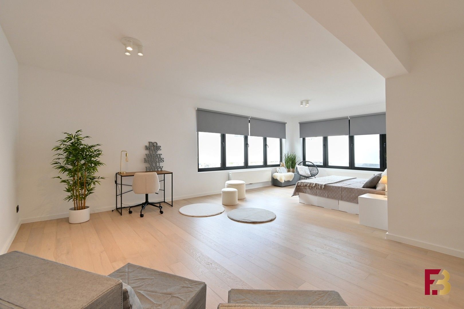 Gelijkvloersappartement met tuin en twee garages in hartje Zwijnaarde foto 9