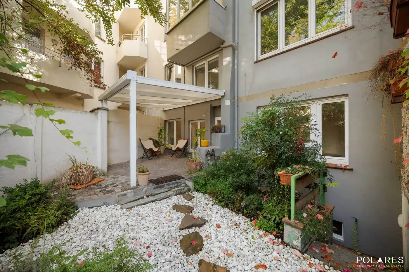 Gelijkvloers appartement met prachtige tuin én polyvalent bijgebouw! foto 13
