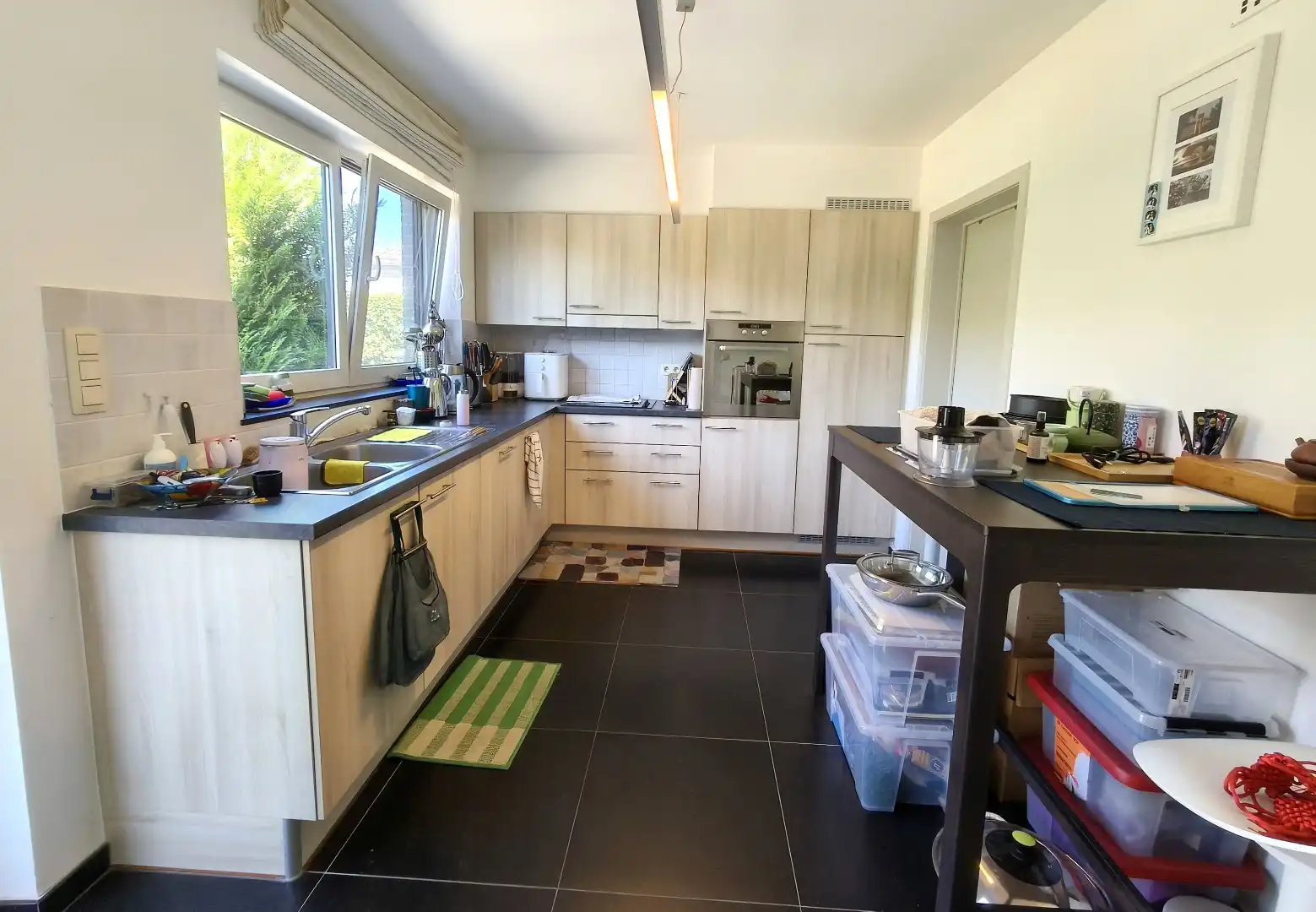 RUIM GELIJKVLOERS APPARTEMENT MET TUIN EN GARAGE foto 4
