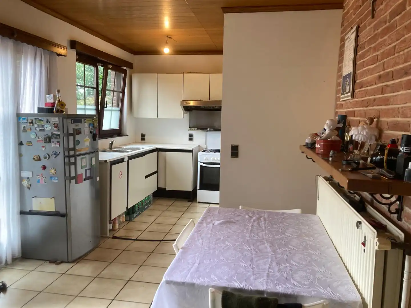 Knusse, op te frissen  bungalow met 2 slk's en voortuin  foto 3