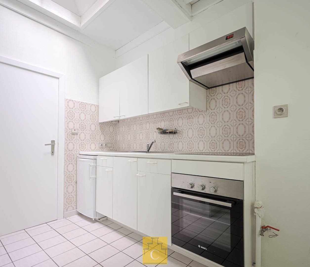 handelshuis op toplocatie vlakbij de Markt, dubbele 17e eeuwse trapgevel, knappe winkel/kantoor, 2 cosy appartementen met 2 à 3 slaapkamers, terras foto 13