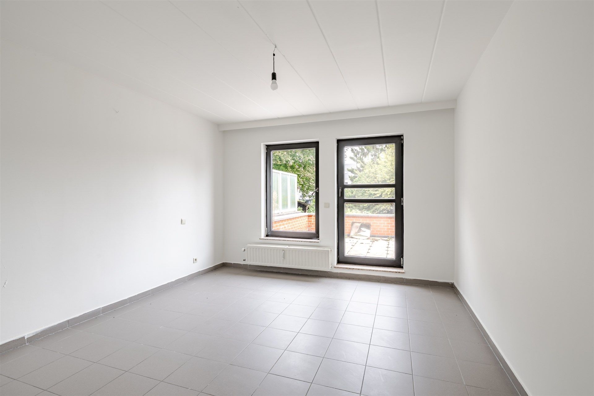 Opbrengsteigendom bestaande uit 6 ruime appartementen + 7 ondergrondse autostaanplaatsen foto 24