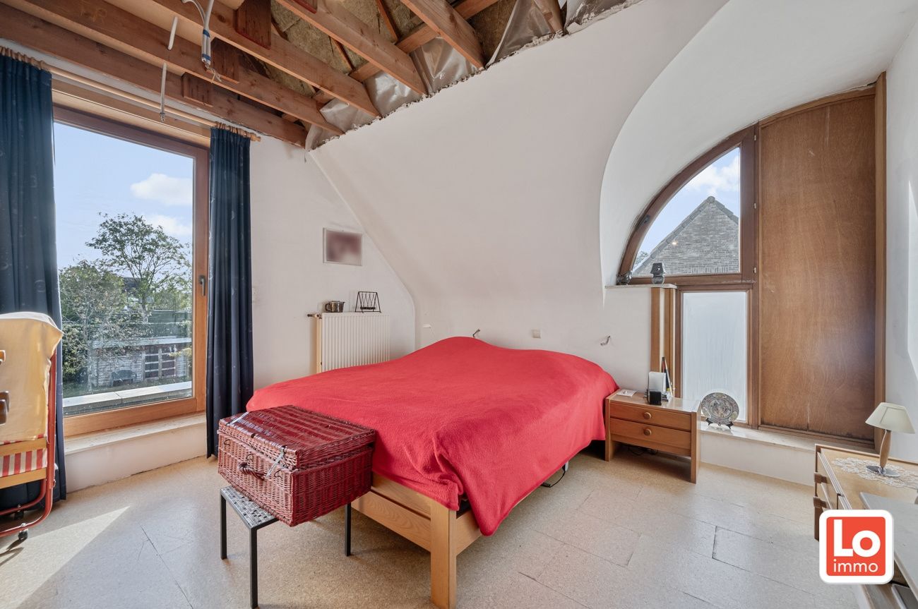 Ruime degelijke alleenstaande woning met afzonderlijke garage en carport op een makkelijk bereikbare locatie in Lokeren! foto 13