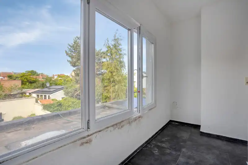 Op te knappen woning met veel potentieel in rustige woonomgeving foto 8