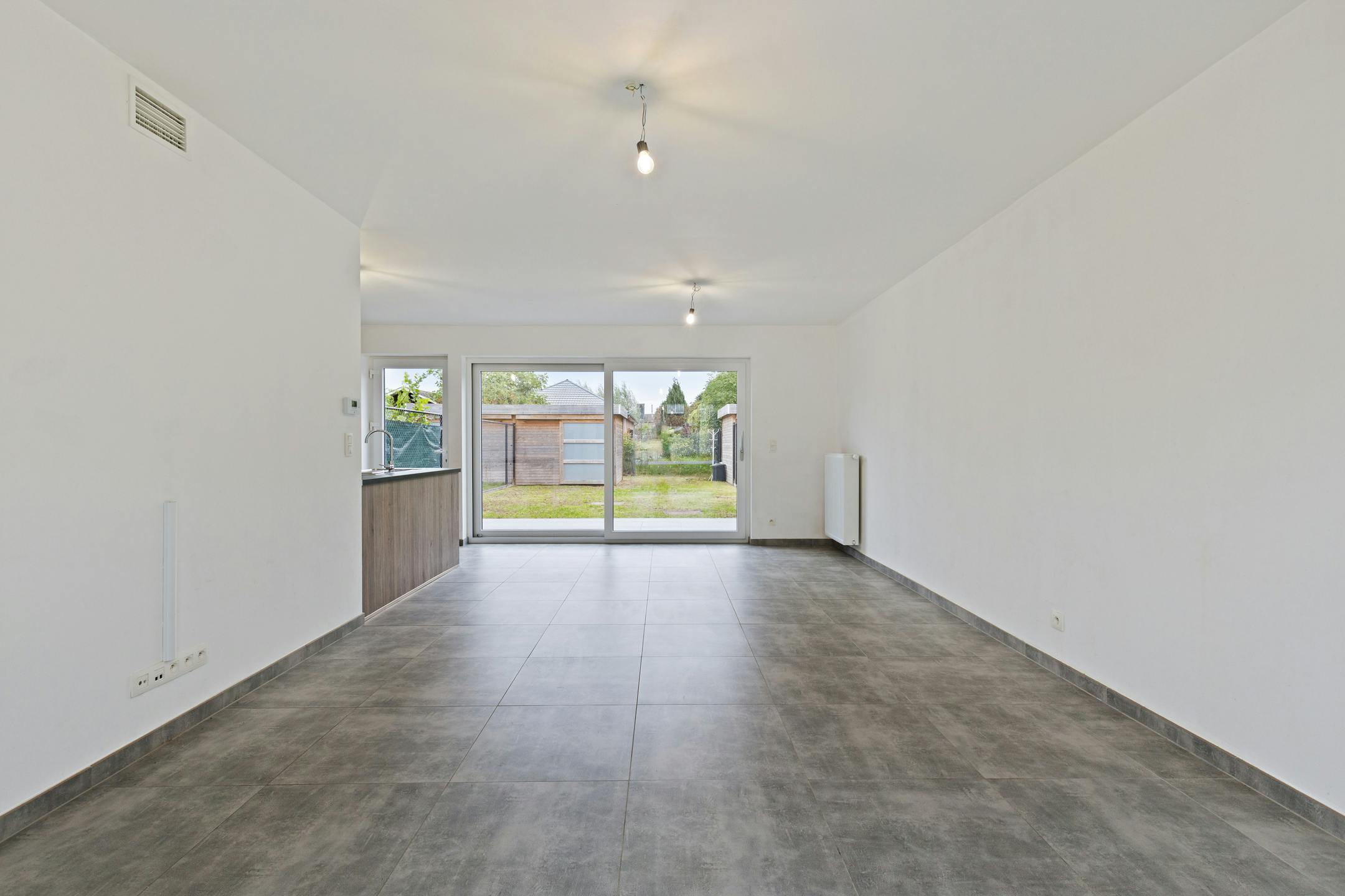 Instapklare woning met carport te koop in centrum Eeklo foto 3