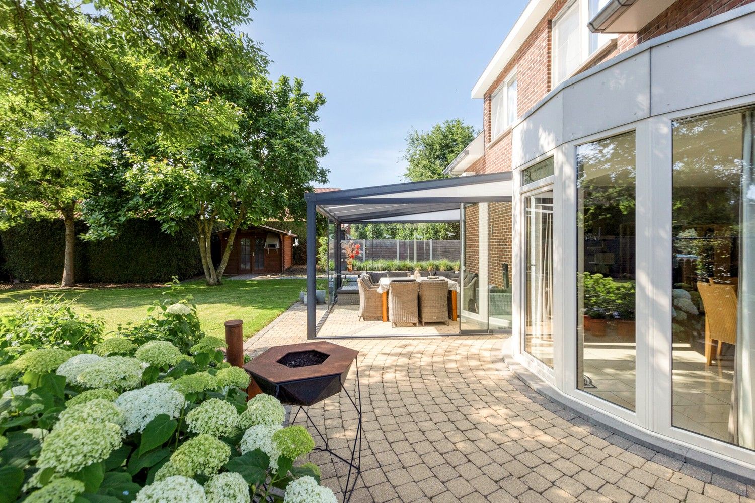 Charmante gezinswoning met drie slaapkamers en prachtige tuin in Dilsen-Stokkem foto 2