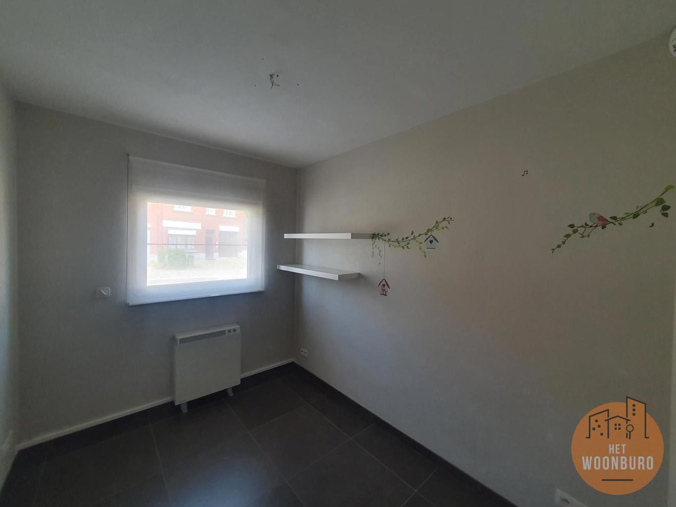 Prachtig gelijkvloersappartement met 3 slpks, garage en tuin foto 11