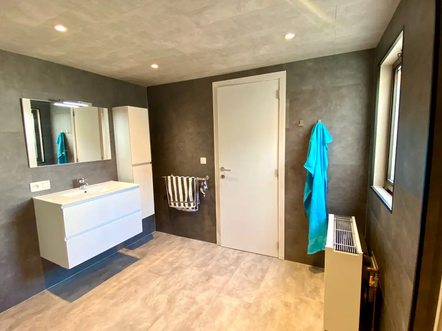 Instapklare rijwoning in het hart van Harelbeke met uitweg voor fietsen foto 11