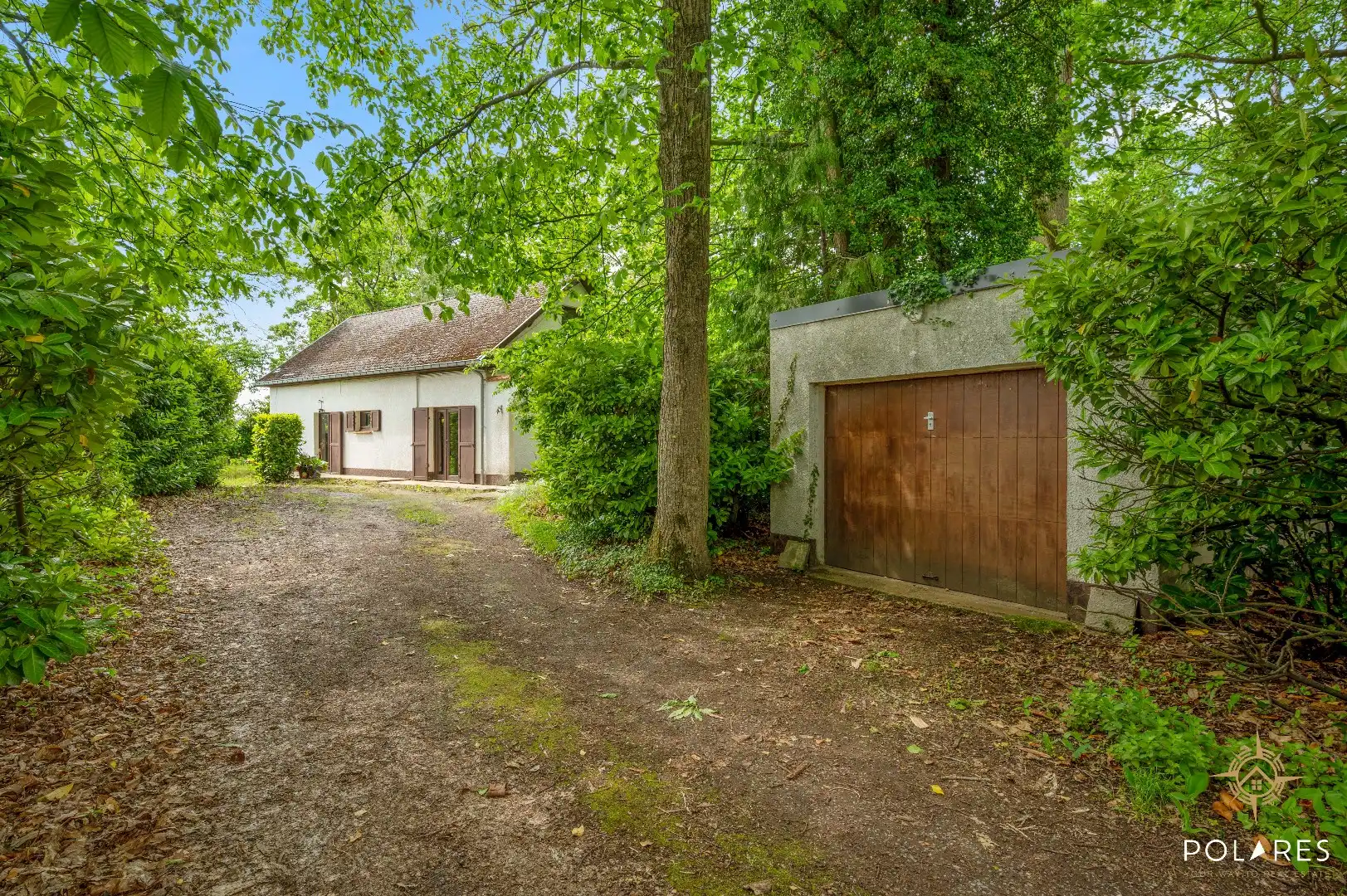 Charmante vrijstaande woning midden in het groen – unieke ligging op 27a 64ca foto 3