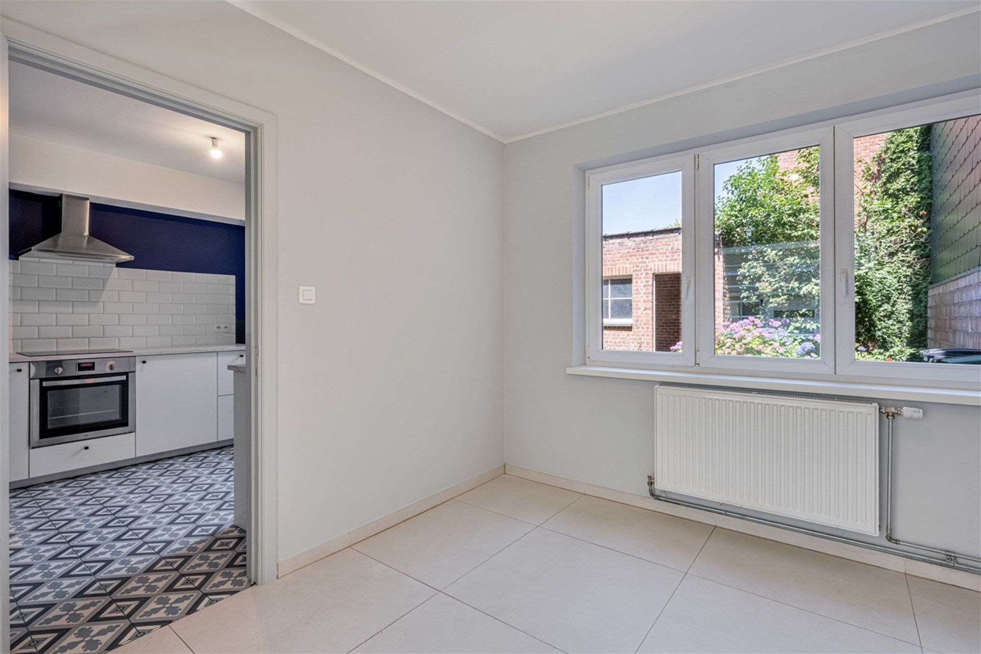 Ruime stadswoning met drie slaapkamers en tuin in centrum Aalst foto 8