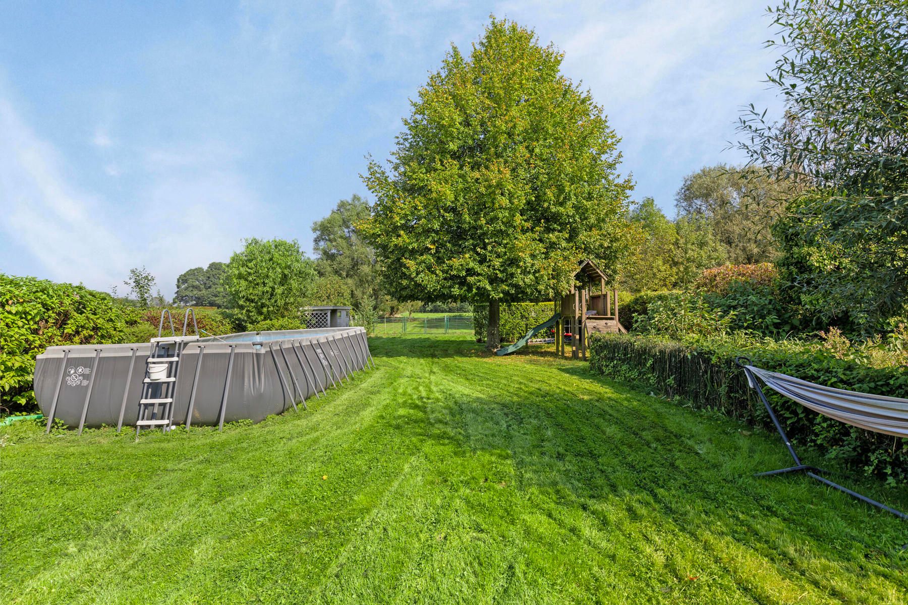 Instapklare villa met 5 kamers, 2 badkamers en grote tuin! foto 31