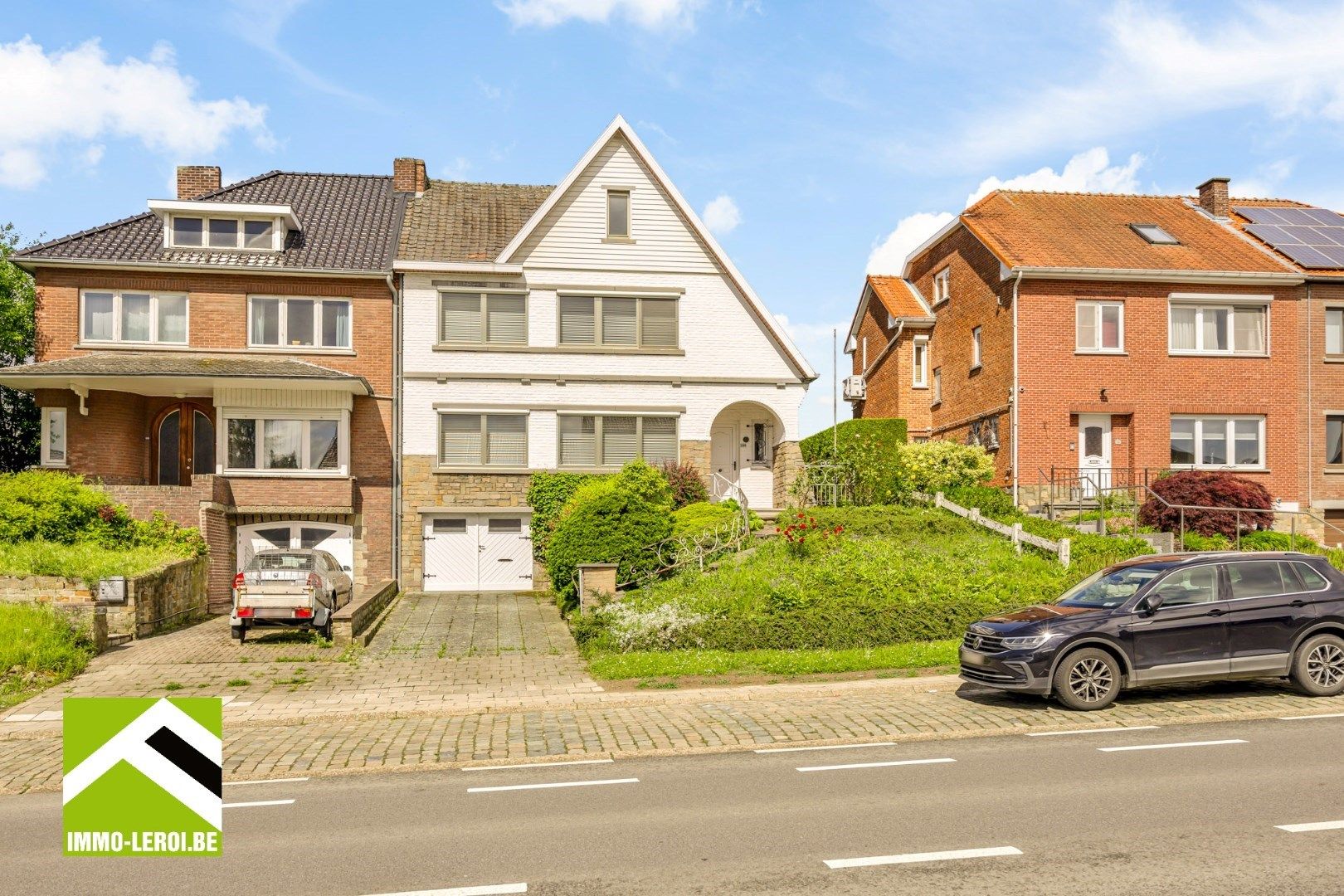 Mooie woning in stadsrand met aangename tuin en 2 garages foto 1