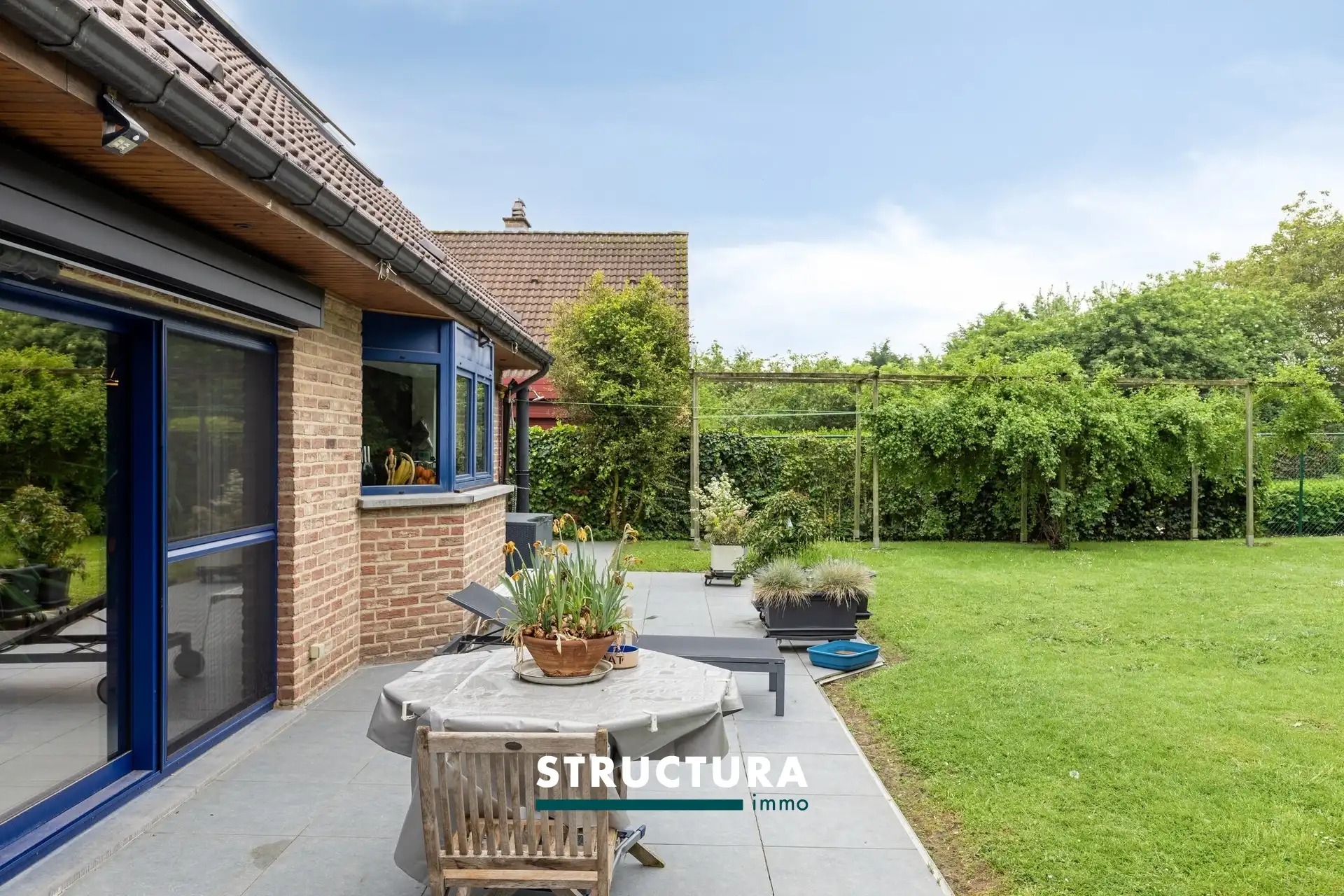 Gezinsvilla op topligging met prachtige ZW tuin foto 13