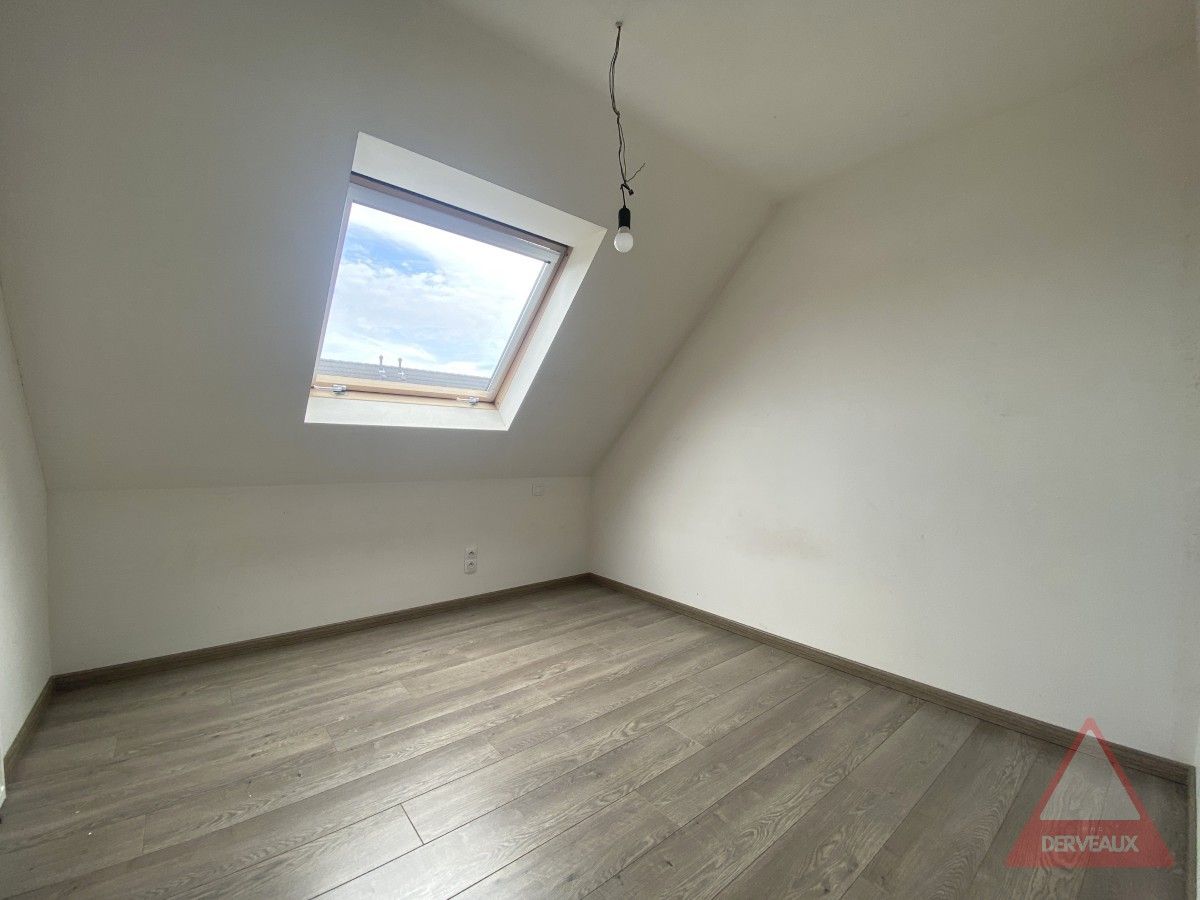 Roeselare – Instapklare gezinswoning met zonnige tuin en carport foto 10