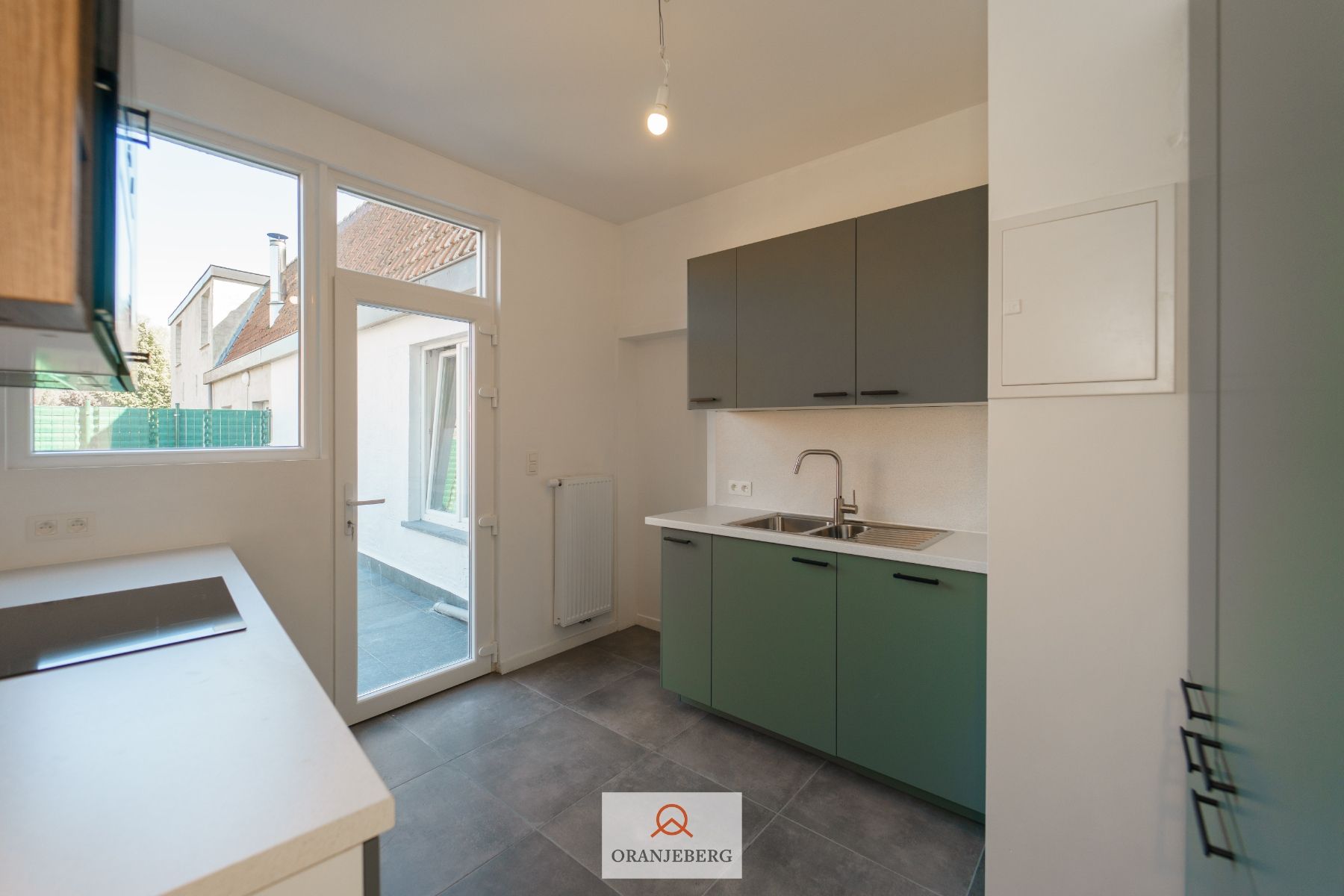 Gelijkvloerse duplex met buitenruimte te Gent/Melle foto 2