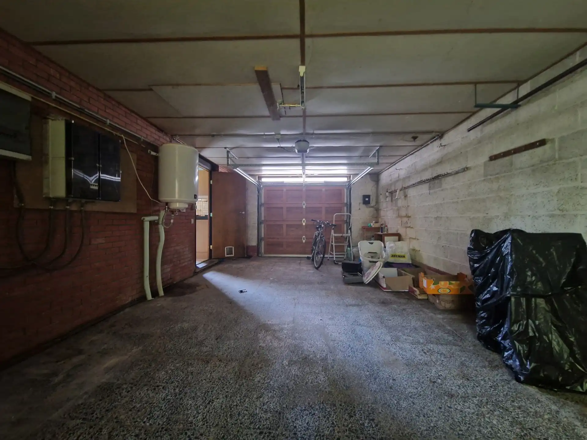 Gelijkvloerse, te renoveren woning op 10 are  foto 9